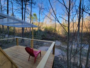 Transforming A-frame glamping site at Fall Creek Retreats on the water right side