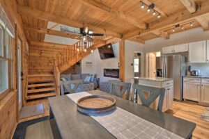 Mountain vacation cabin kitchen table and den view