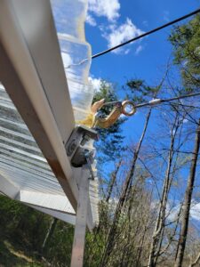 A-frame glamping vacation swing wall on the creek