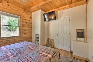 NC mountain cabin master bedroom with smart tv